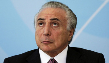 Por que a crise política faz a Selic cair menos?